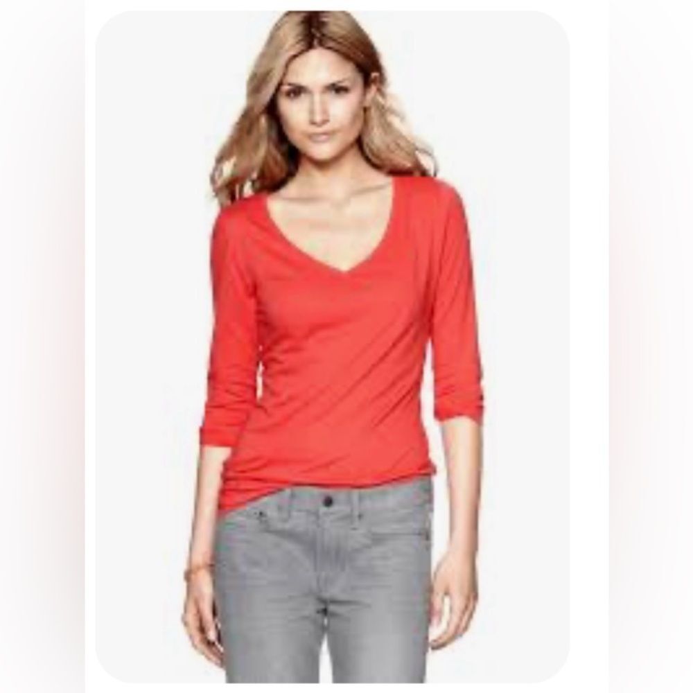 New York & Company Size S sheer Tangerine color 3/4 sleeves top rousing on sides